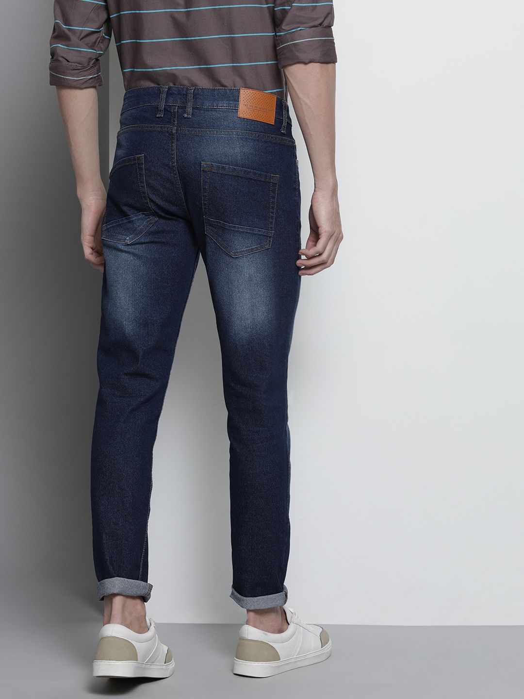 The Indian Garage Co Men Navy Blue Slim Fit Mildly Distressed Light Fade Stretchable Jeans