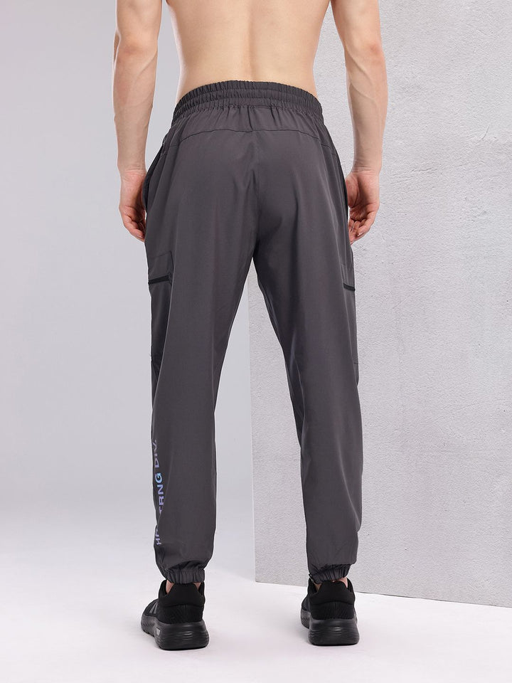 HRX by Hrithik Roshan Men Brand Logo Print Mid-Rise Rapid-Dry Training Cargo-Style Joggers