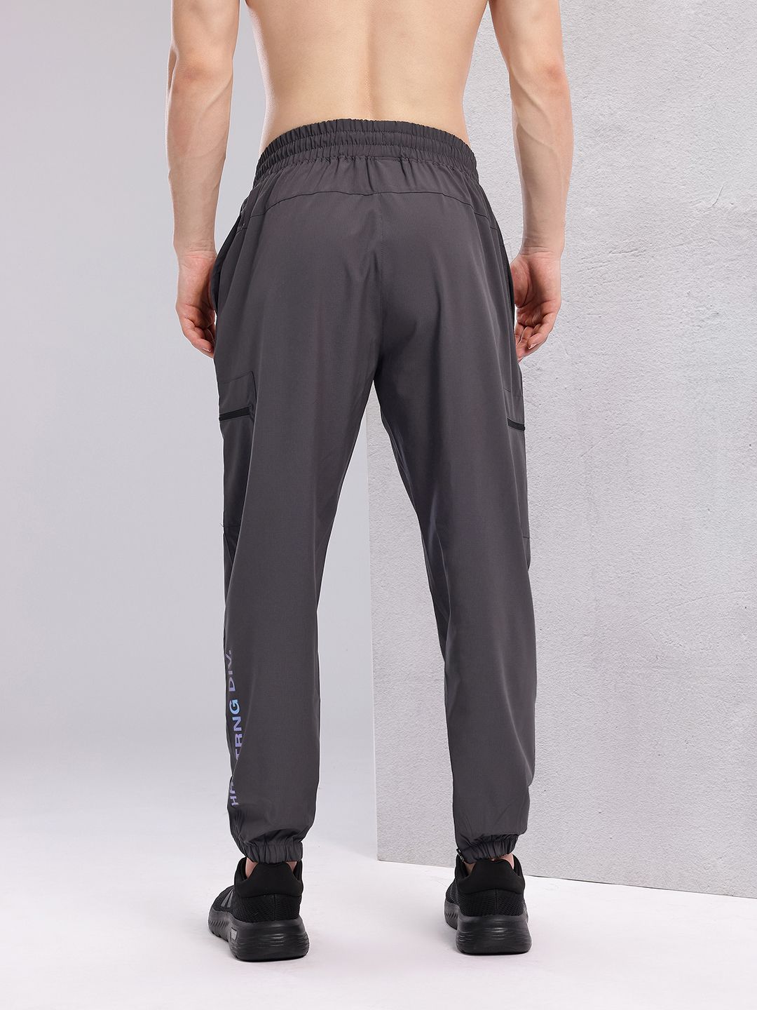 HRX by Hrithik Roshan Men Brand Logo Print Mid-Rise Rapid-Dry Training Cargo-Style Joggers