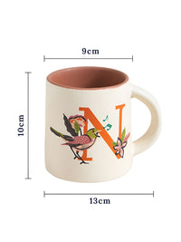 Chumbak Off White &amp; Orange Printed Ceramic Glossy Mug 300 ml