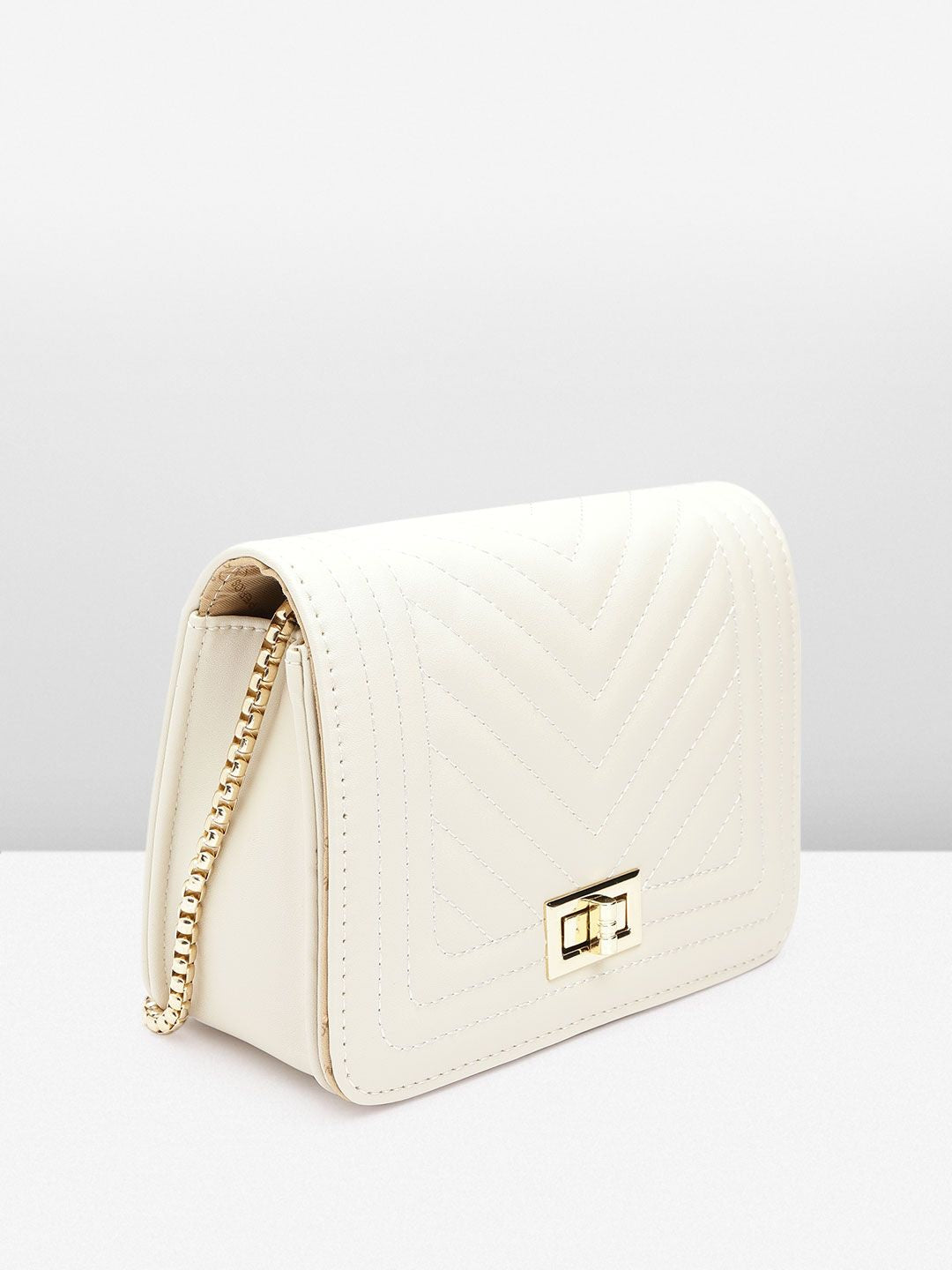 Lino Perros Structured Sling Bag with Quilted Detail