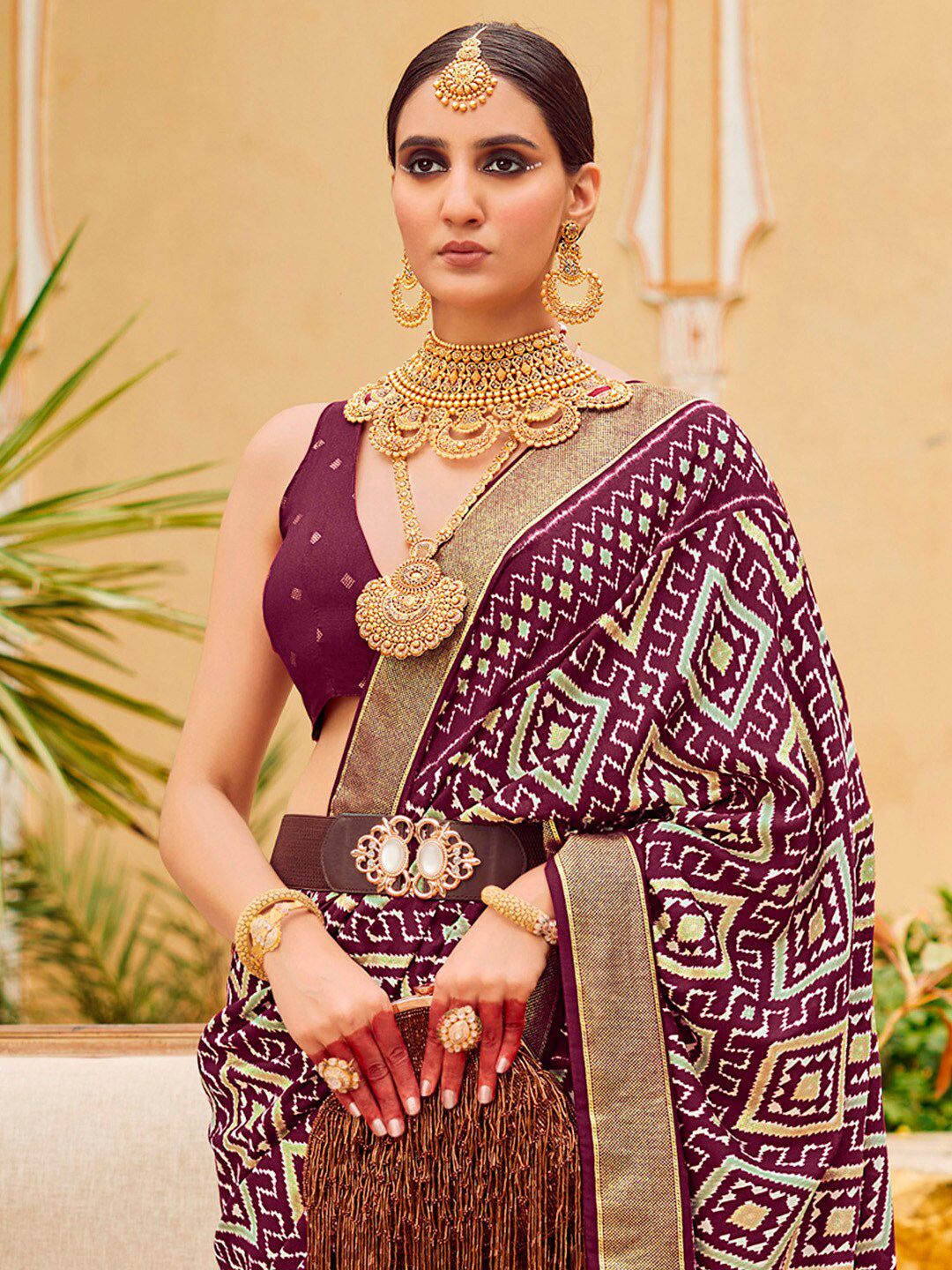 Saree mall Ethnic Motifs Printed Ikat Sarees with Tassels