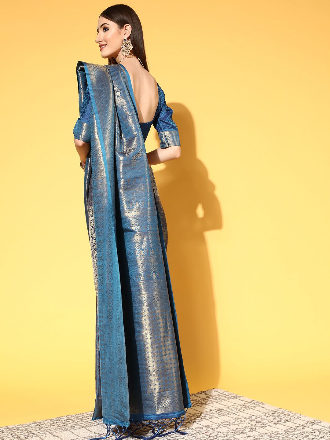 Saree mall Blue & Golden Ethnic Motifs Silk Blend Sarees