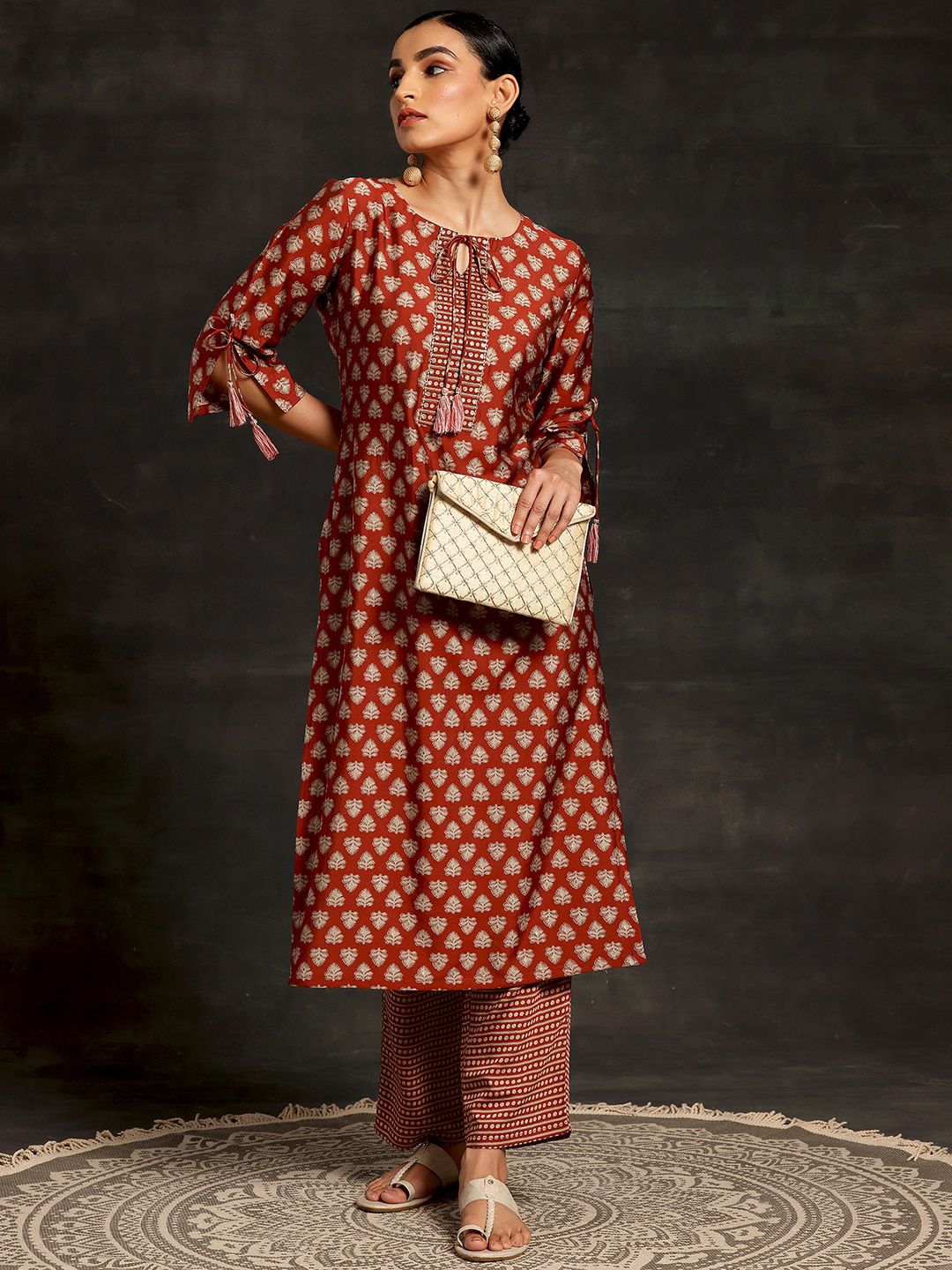 Libas Floral Printed Tie-Up Neck Three-Quarter Sleeves Sequinned Kurta with Trousers