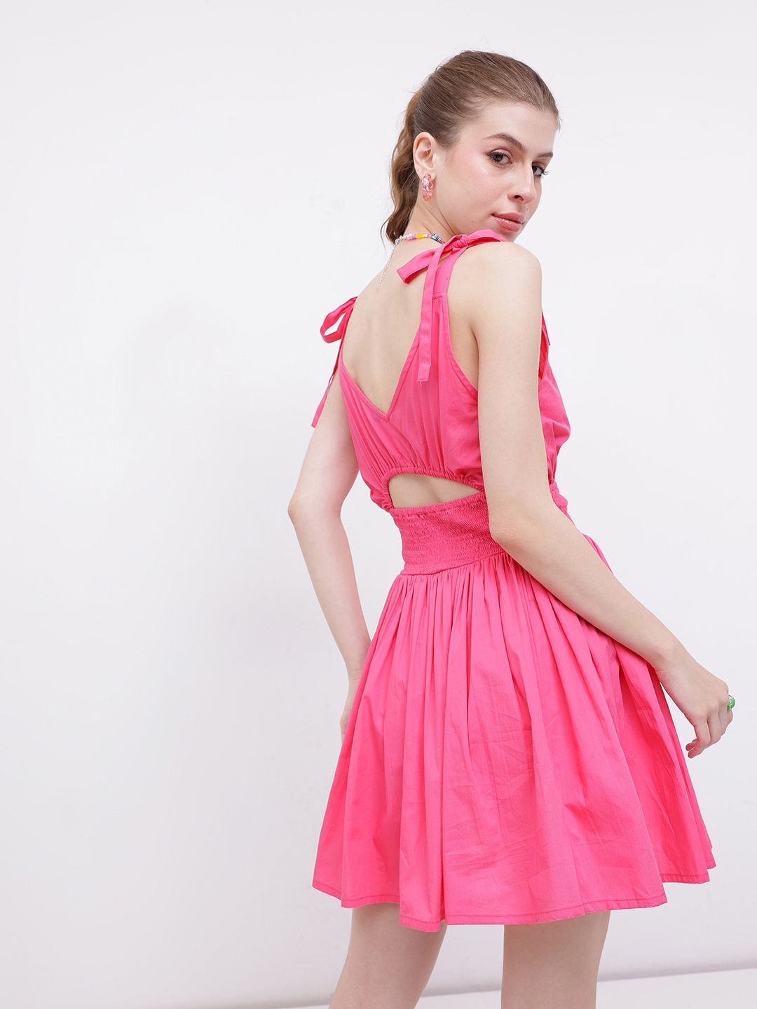DressBerry Pinktastic Smocked Cut-Out Cinched Waist A-Line Mini Dress