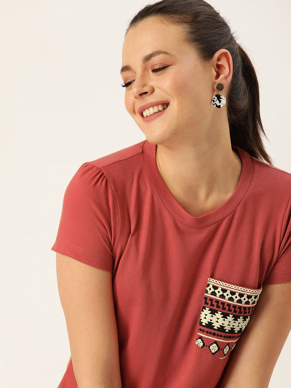 DressBerry Women Coral Red Solid Round Neck T-shirt With Detailed Pocket