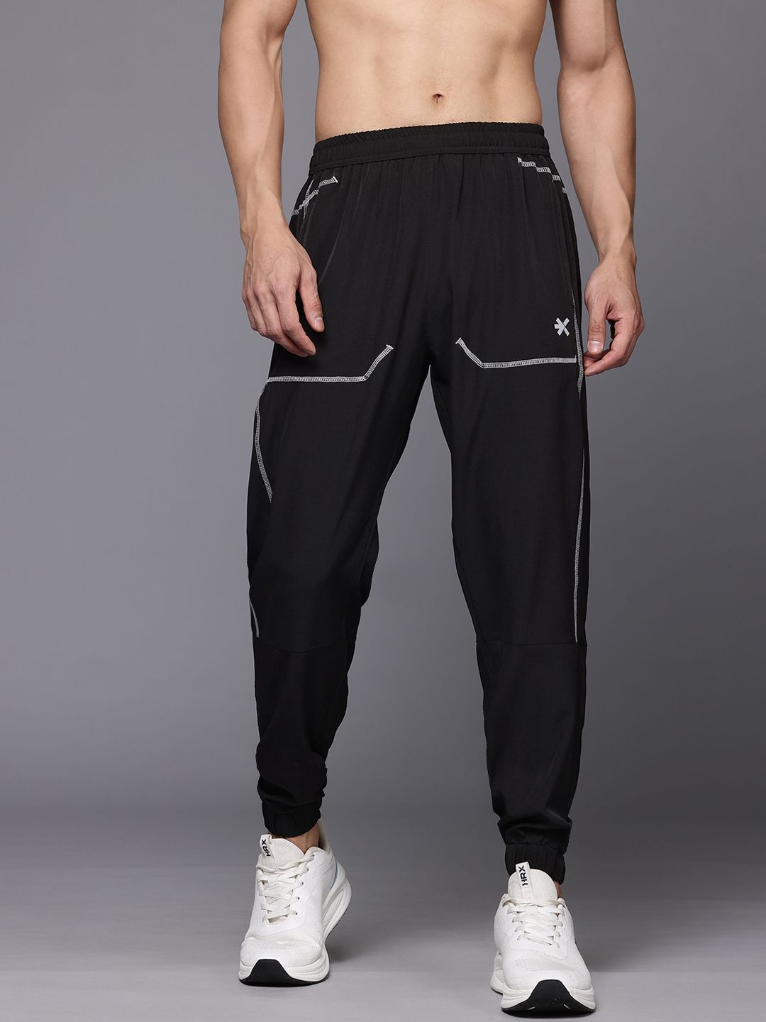 HRX oleh Hrithik Roshan Men Mid-Rise Training Joggers dengan jalur reflektif