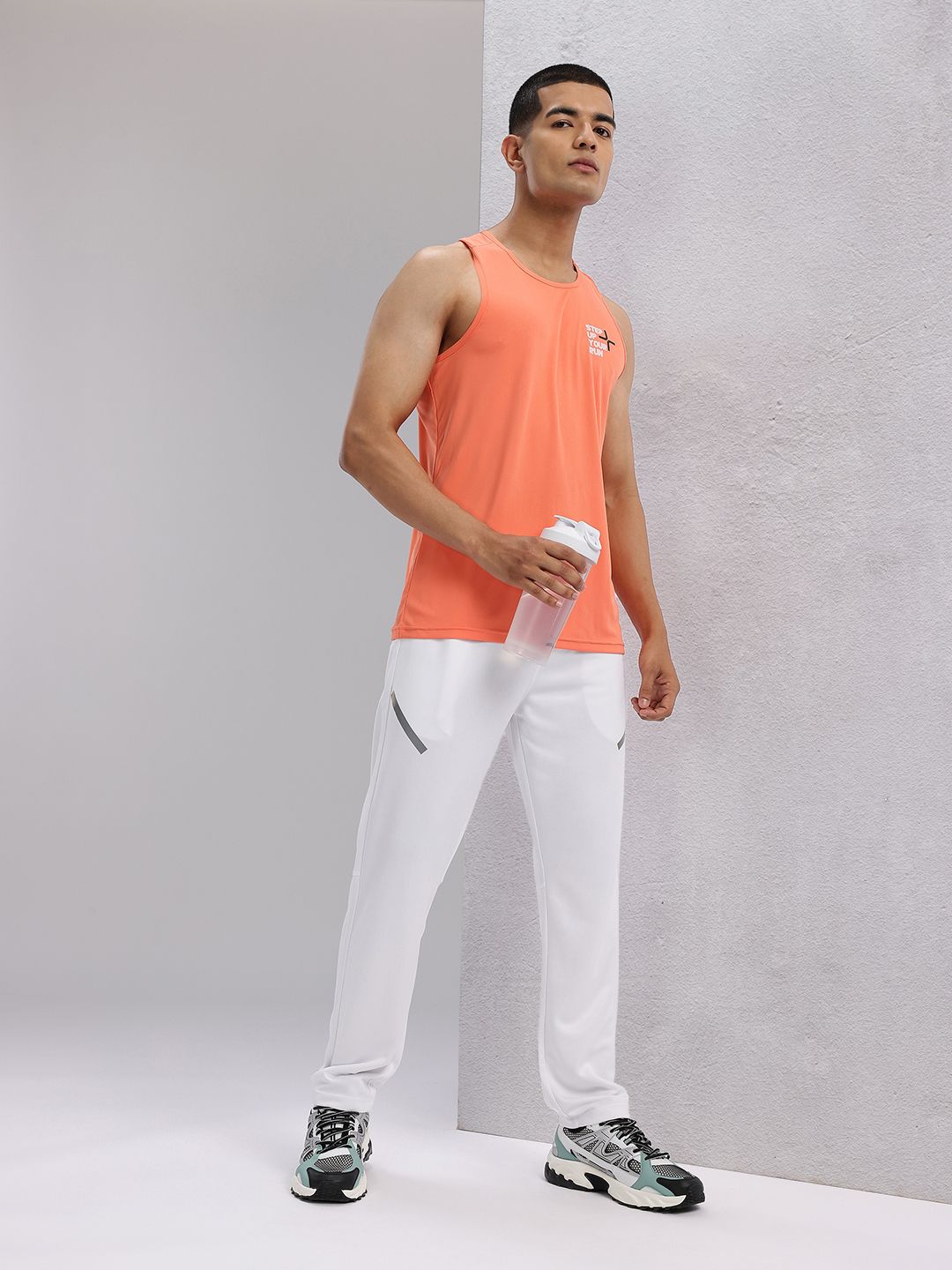 HRX by Hrithik Roshan Men Rapid-Dry Mid-Rise Regular Fit Running Track pants