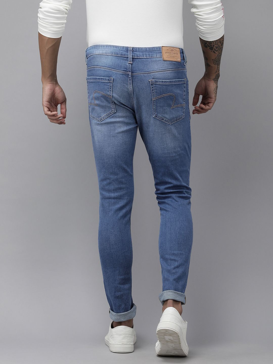 SPYKAR Men Blue Super Skinny Slim Fit Low-Rise Tapered Leg Light Fade Stretchable Jeans