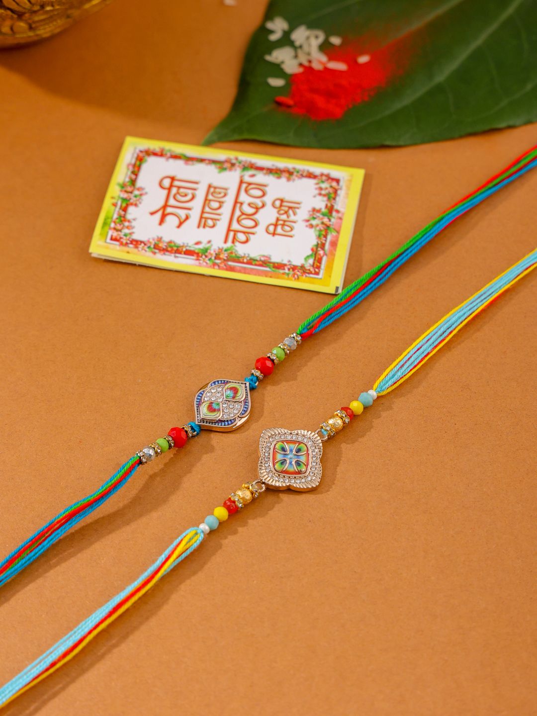 Set Uniseks NVR 2 Rakhi Benang Batu Tiruan Pelbagai Warna Dengan Roli Chawal