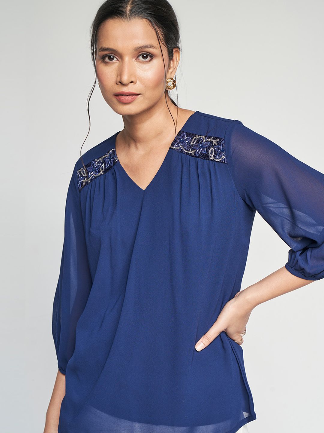 AND V-Neck Embellished Top
