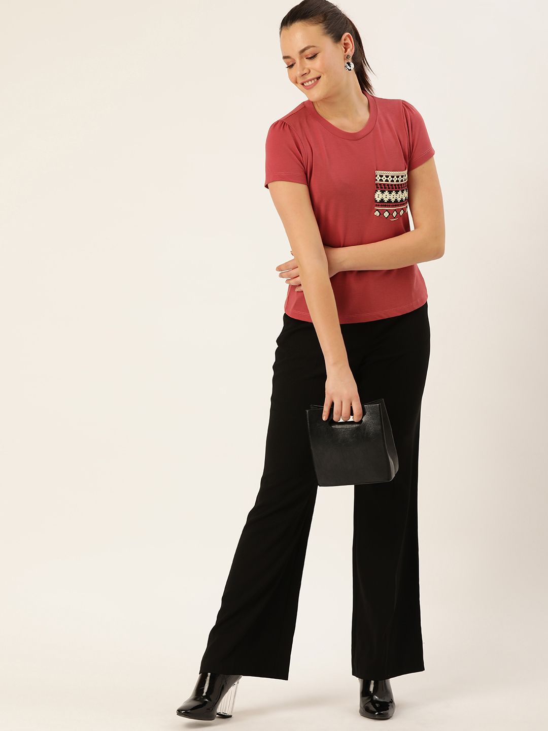 DressBerry Women Coral Red Solid Round Neck T-shirt With Detailed Pocket
