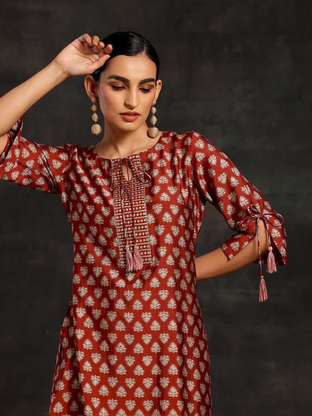 Libas Floral Printed Tie-Up Neck Three-Quarter Sleeves Sequinned Kurta with Trousers