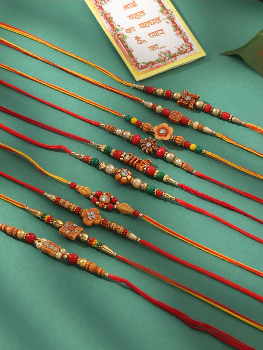 NVR Unisex Set of 10 Floral  Red Artificial Stones and Beads Thread Rakhi With Roli Chawal
