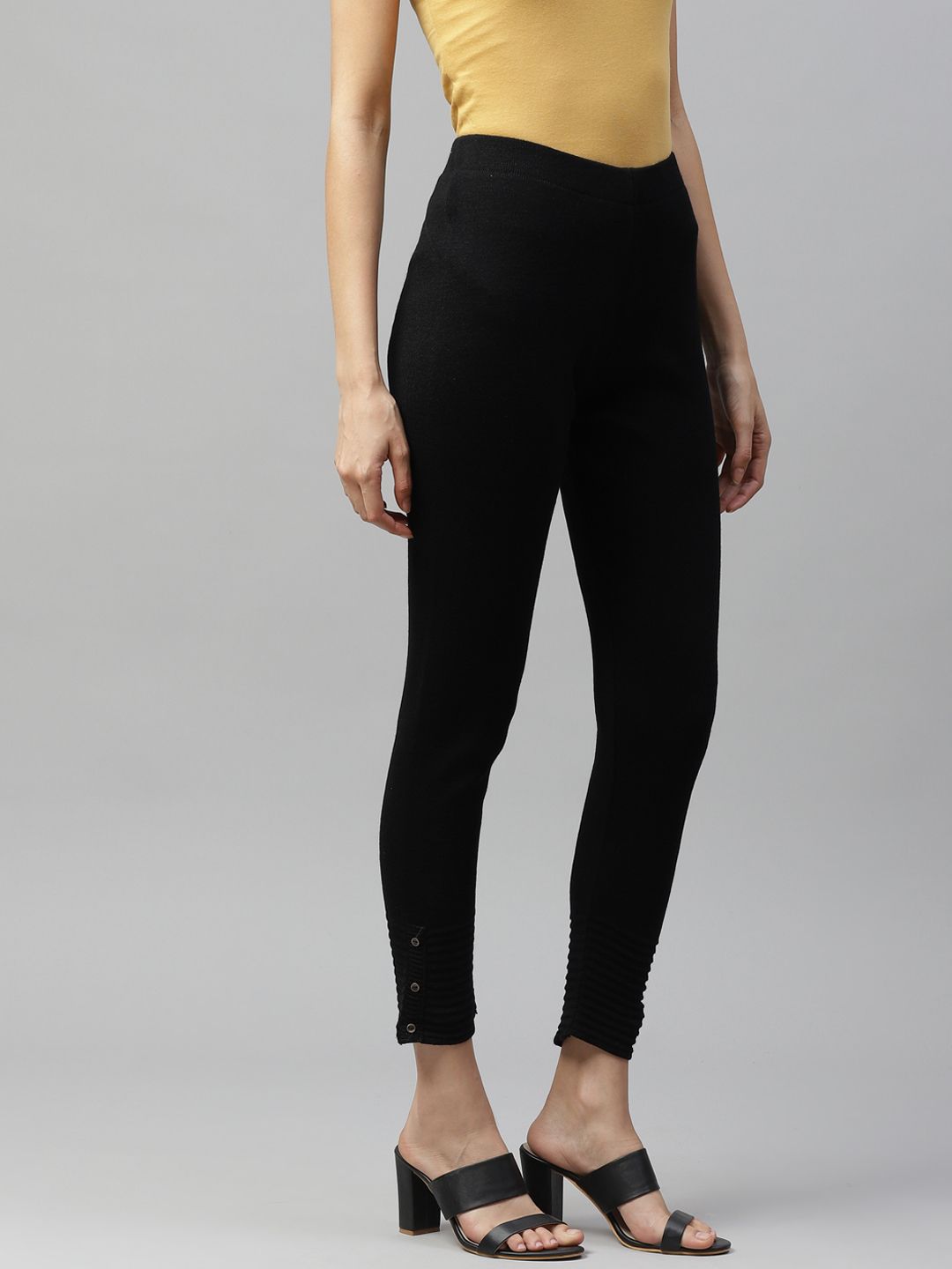 Women W Black Solid Cropped Leggings with Pintucked Hemline