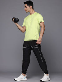 HRX oleh Hrithik Roshan Men Mid-Rise Training Joggers dengan jalur reflektif