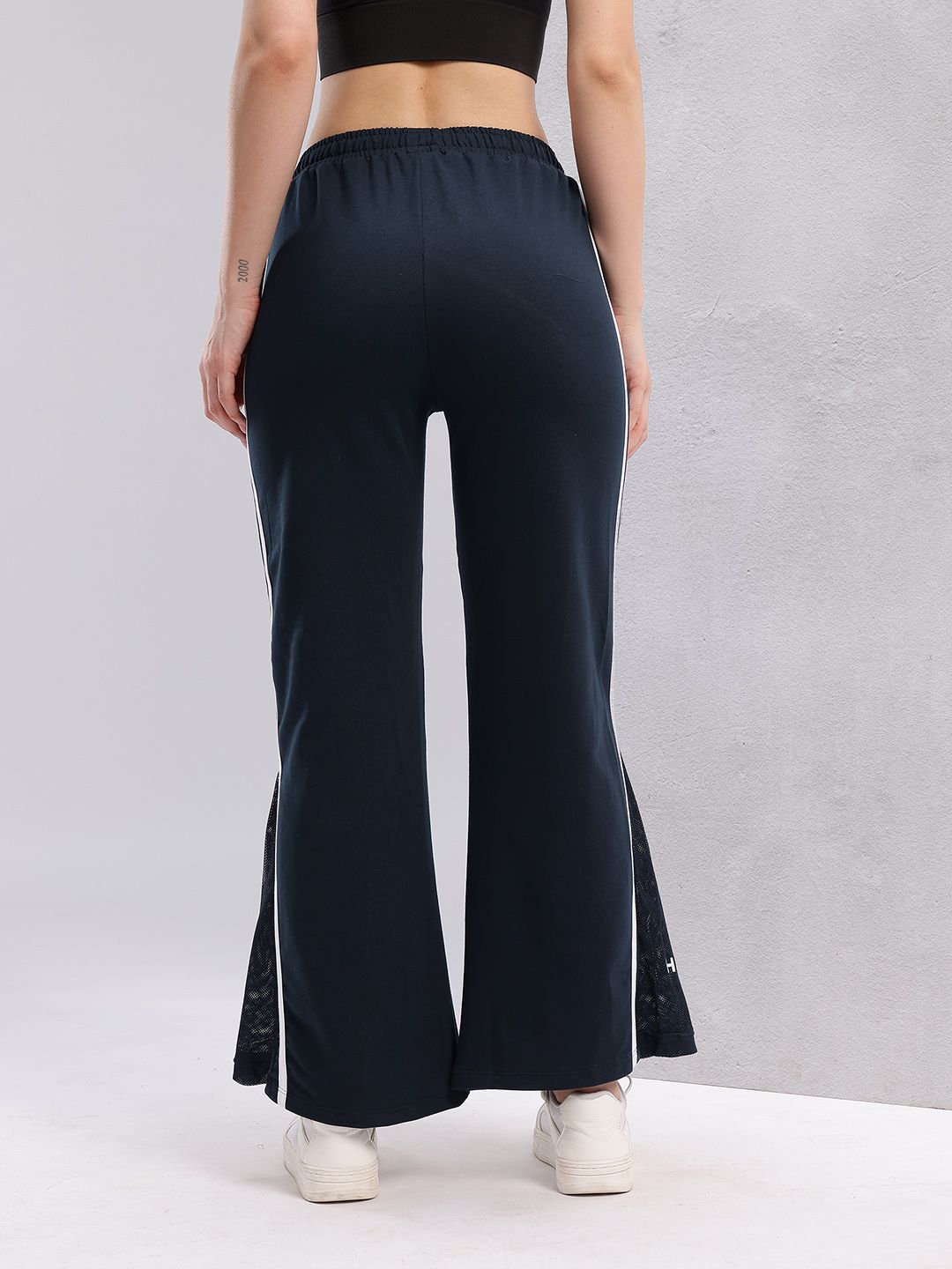 HRX by Hrithik Roshan Women Flared Fit Mesh Inserts Training Track Pants with Side Stripes