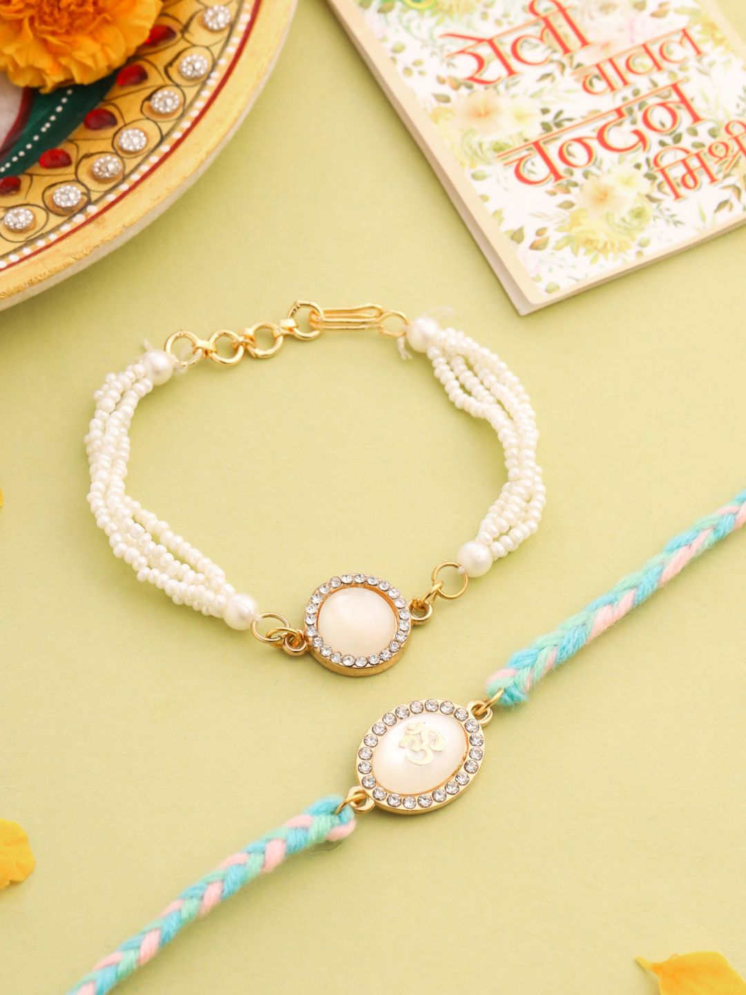 NVR Set of 2 White Pearls & Artificial Beads Bhaiya Bhabhi Rakhi with Roli Chawal