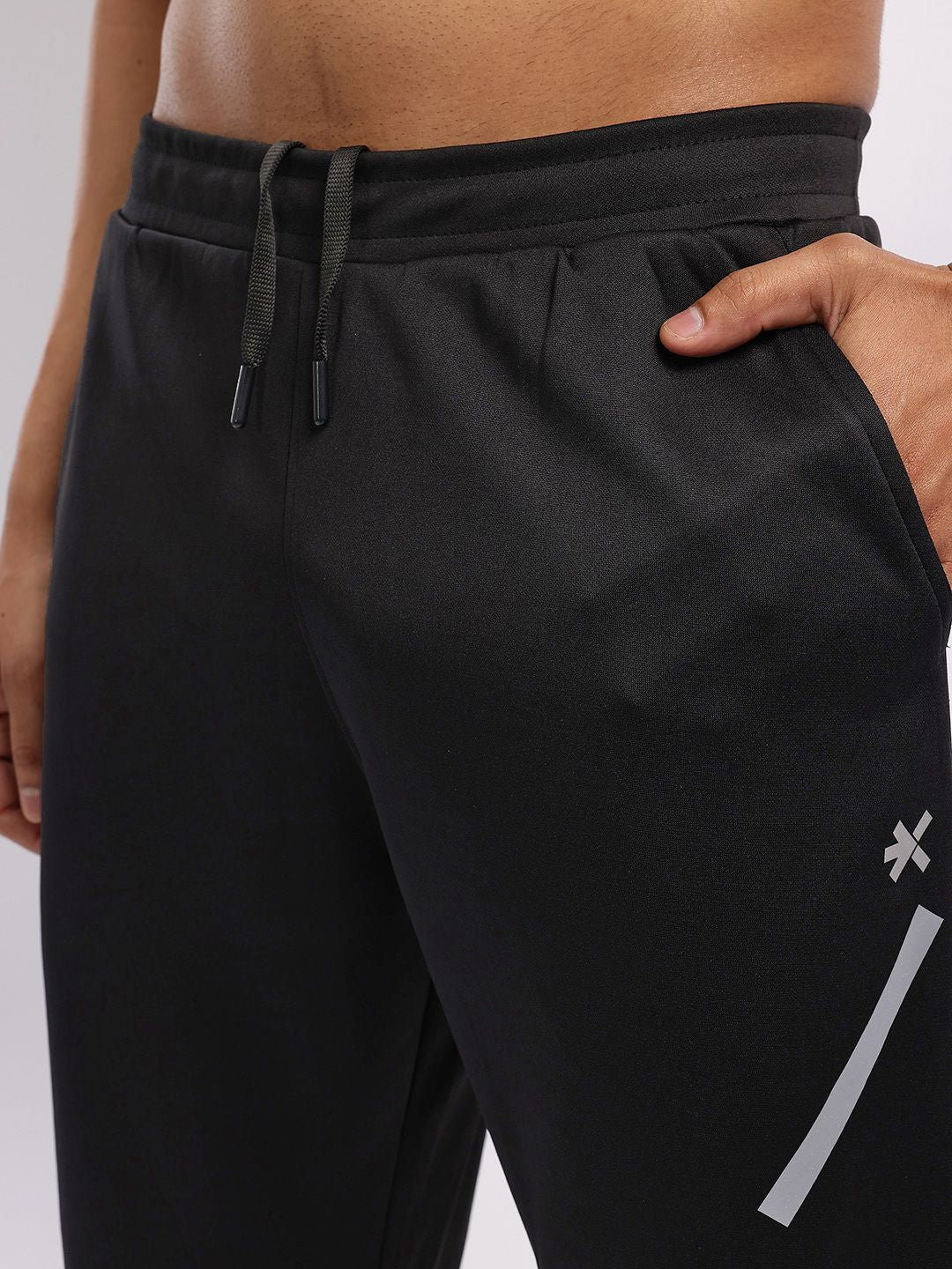 HRX by Hrithik Roshan Men Rapid-Dry Mid-Rise Regular Fit Running Track pants