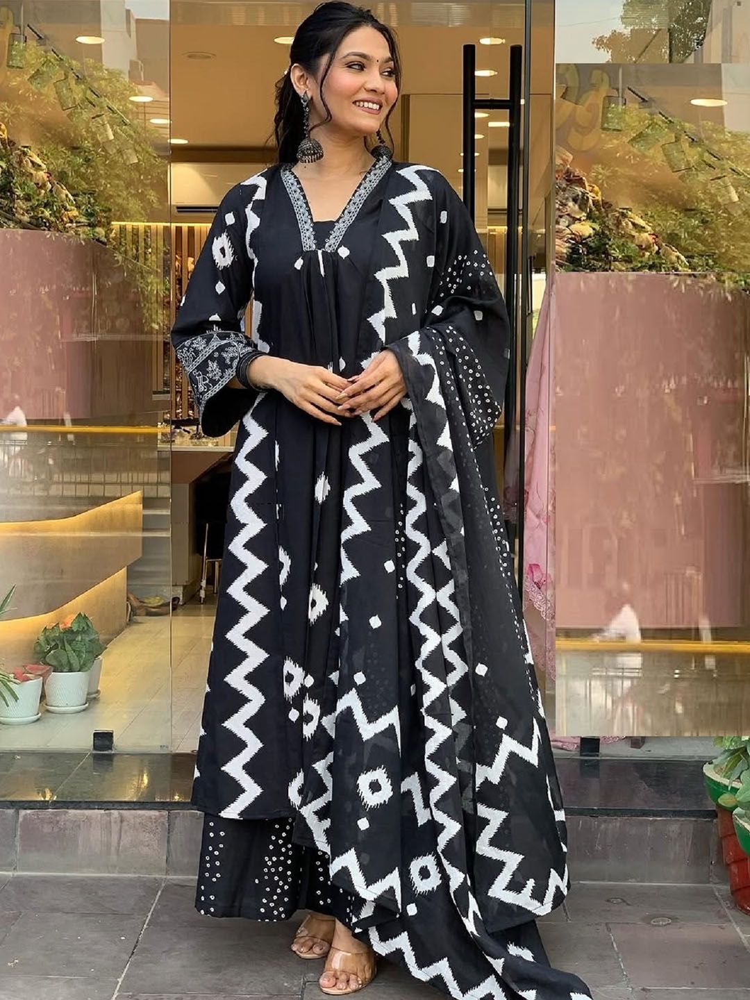 KALINI Geometric Printed Notch Neck Pleated A-Line Kurta With Trouser And Dupatta