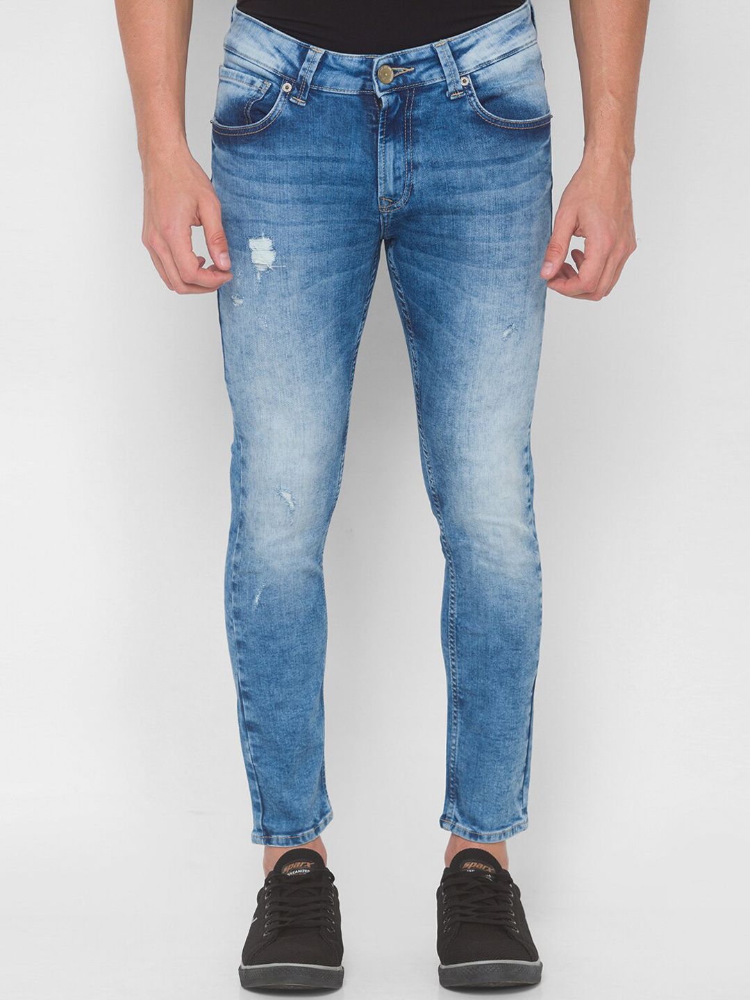 Spykar Men Blue Slim sesuai dengan seluar jeans pudar berat yang agak tertekan