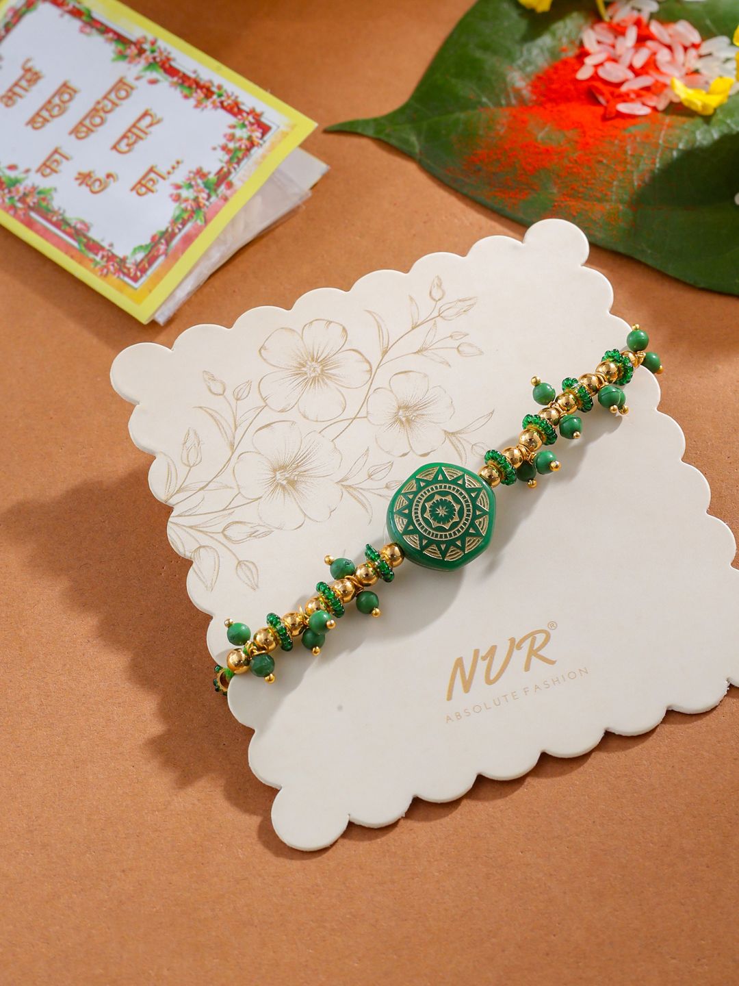 NVR Unisex Green Artificial Beads Round Shape Thread Rakhi with Roli Chawal