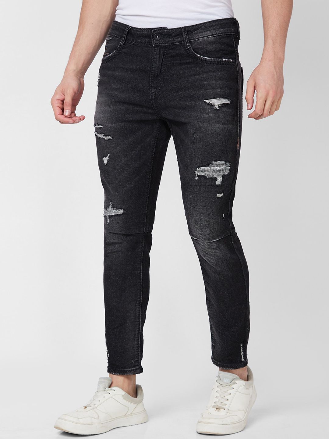 SPYKAR Men Tapered Fit Mildly Distressed Heavy Fade Stretchable Jeans