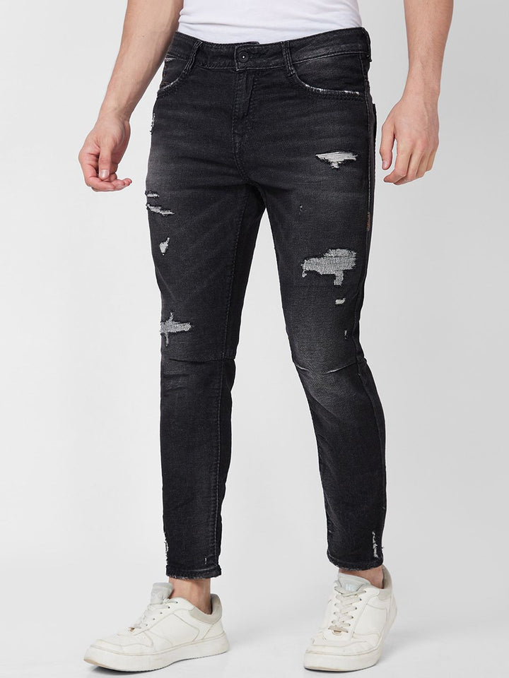 SPYKAR Men Tapered Fit Mildly Distressed Heavy Fade Stretchable Jeans