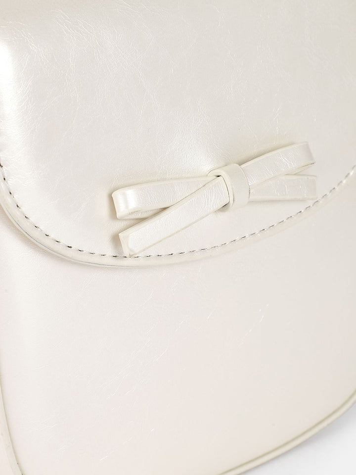DressBerry Textured Structured Sling Bag with Bow Detail