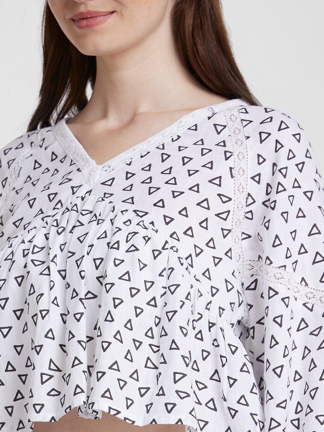 SPYKAR Geometric Printed V-Neck Flared Sleeve Lace Inserts Cotton Peplum Top