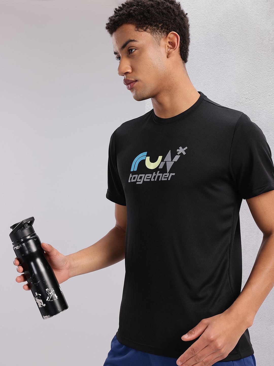 HRX oleh koleksi pasangan Hrithik Roshan dicetak dengan cepat-kering t-shirt