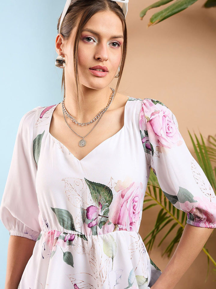 SASSAFRAS Floral Print Puff Sleeves Criss Cross Back Peplum Top