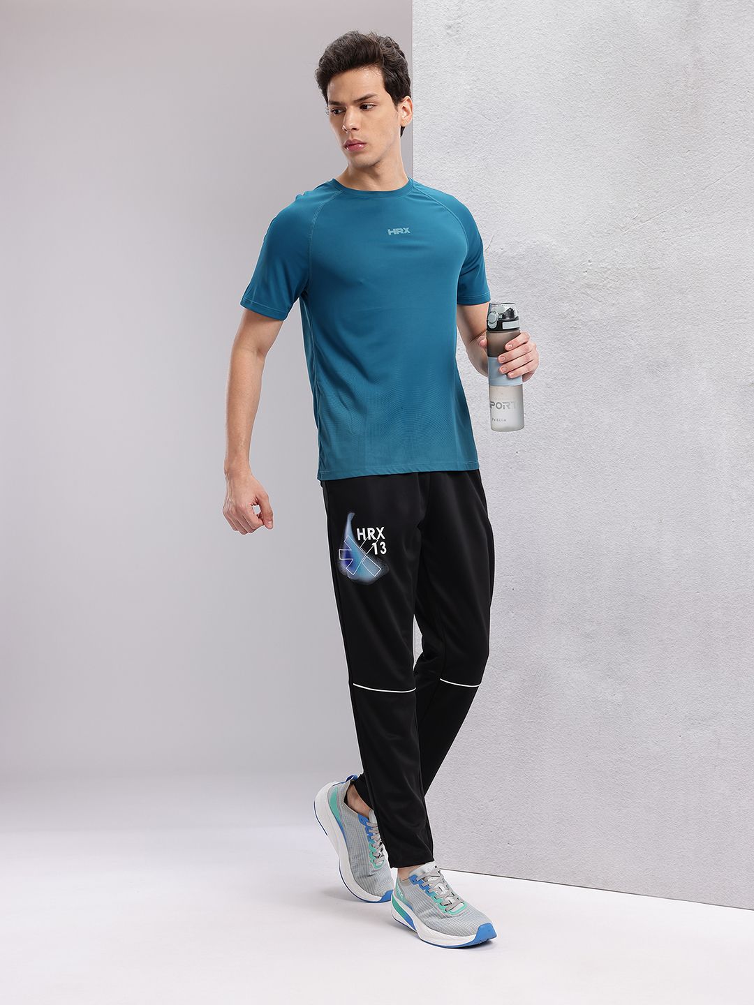 HRX by Hrithik Roshan Men Brand Logo Printed Mid-Rise Rapid-Dry Running Track Pants