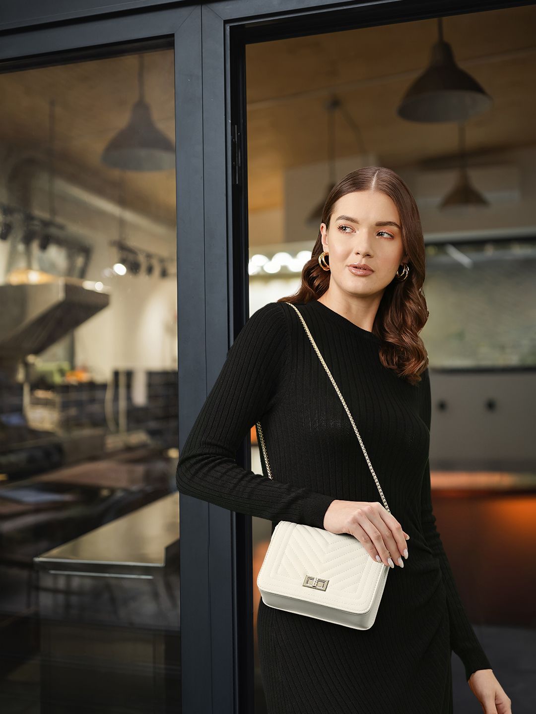 Lino Perros Structured Sling Bag with Quilted Detail