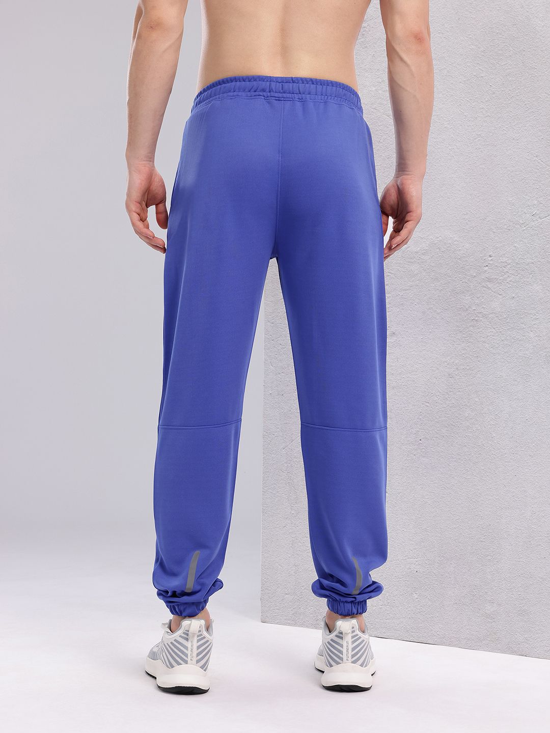 HRX by Hrithik Roshan Men Brand Logo Printed Mid-Rise Rapid-Dry Running Joggers