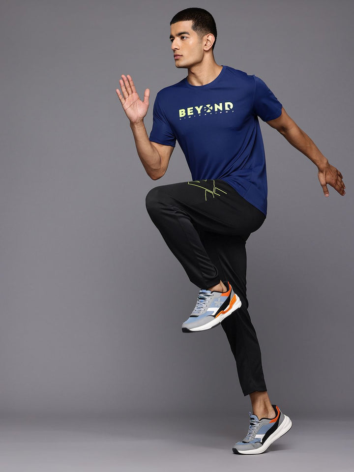 HRX oleh Hrithik Roshan Men Logo Jenama Cetak Seluar Lintasan Running Rapid-kering