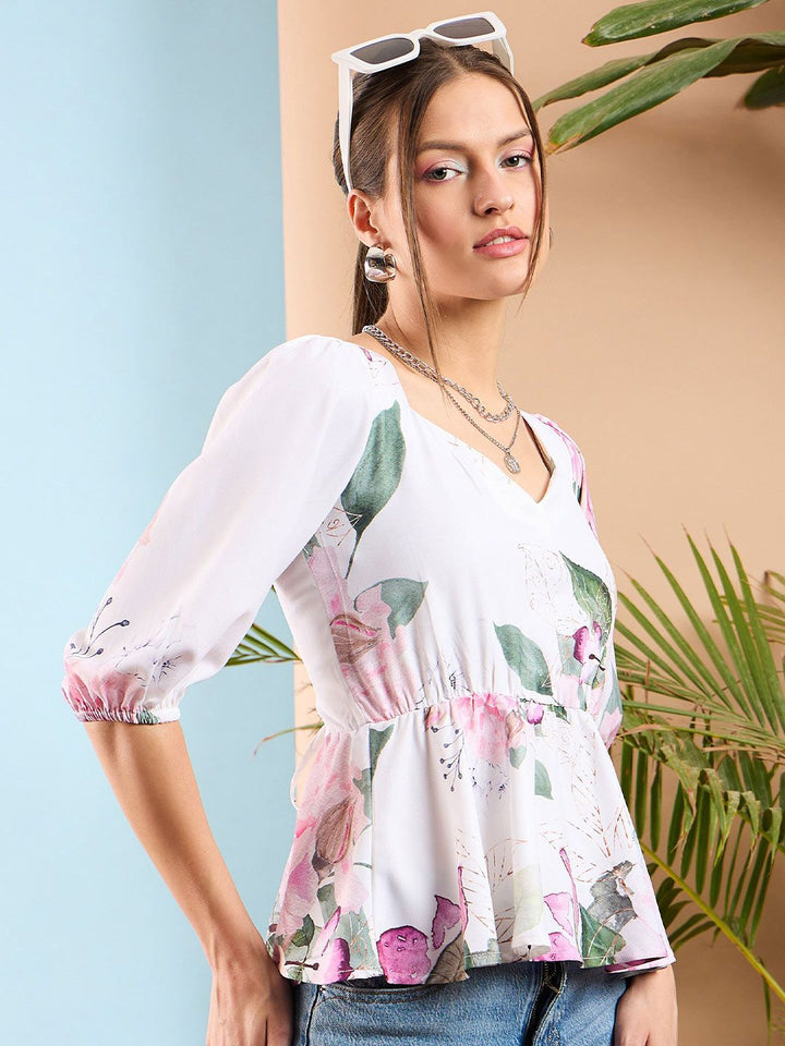 SASSAFRAS Floral Print Puff Sleeves Criss Cross Back Peplum Top