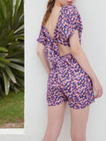 DressBerry Ravishing Beauty Floral Printed Tie Up Cut Out Playsuit