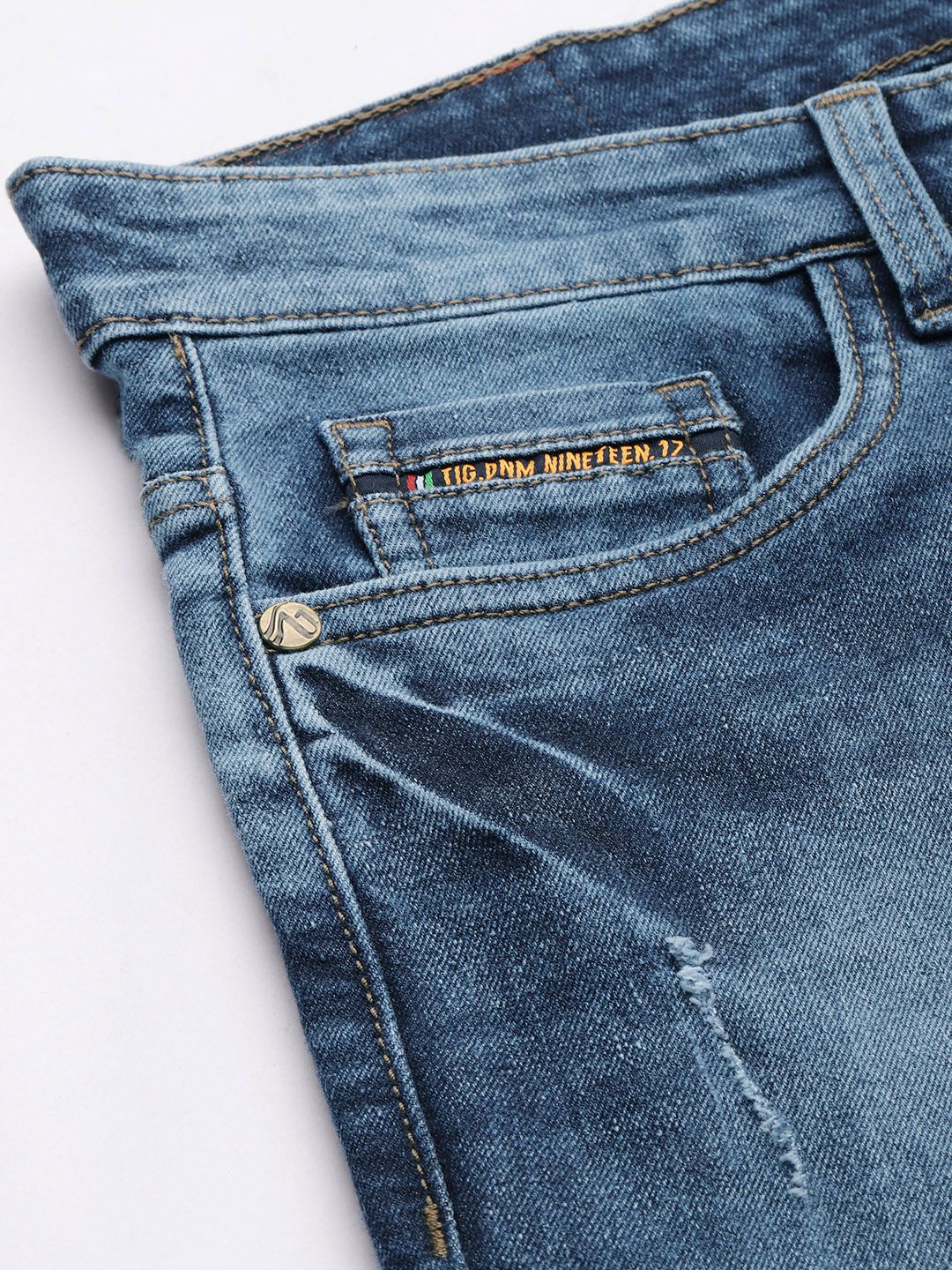 The Indian Garage Co Men Blue Slim Fit Mildly Distressed Light Fade Stretchable Jeans