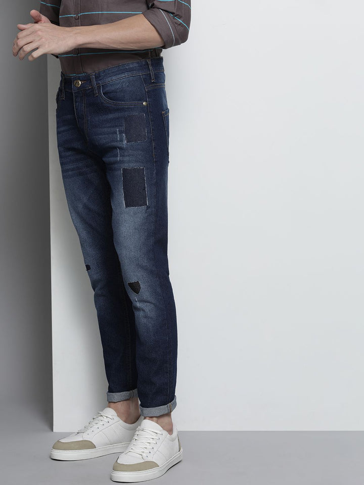 The Indian Garage Co Men Navy Blue Slim Fit Mildly Distressed Light Fade Stretchable Jeans