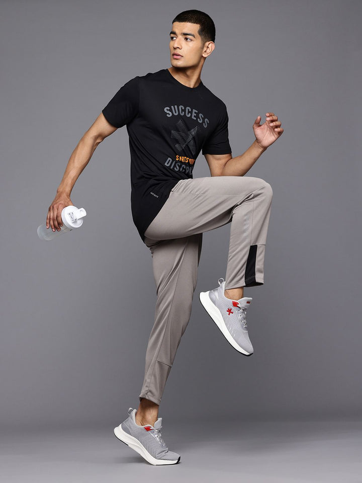HRX by Hrithik Roshan Men Mid-Rise Regular Fit Rapid-Dry Running Track Pants