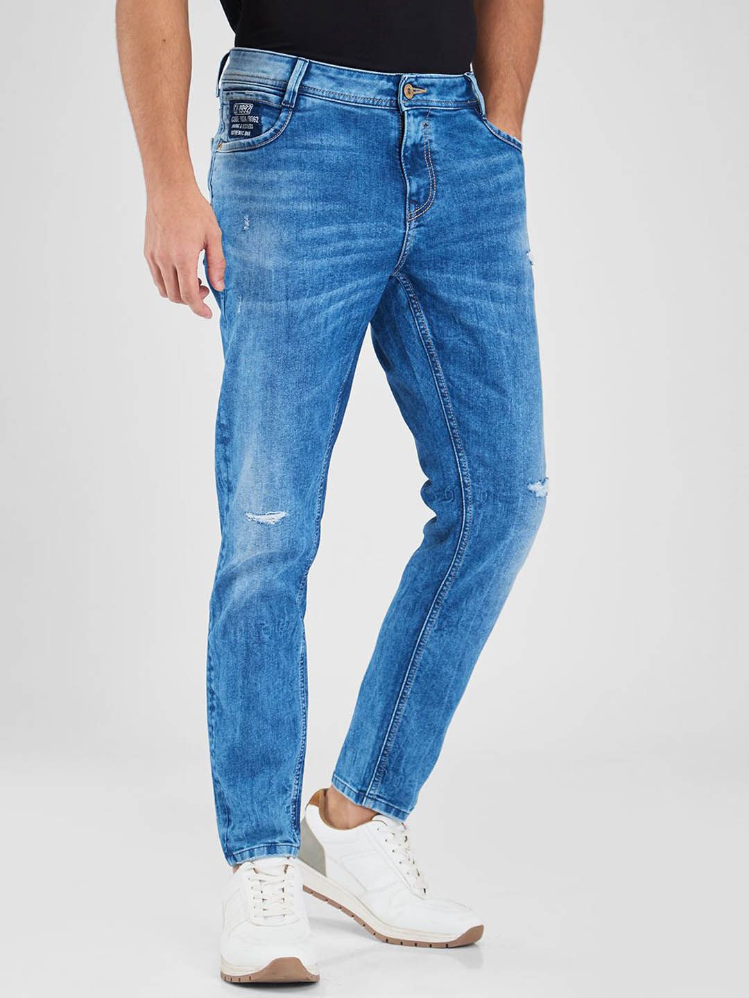 SPYKAR Men Slim Fit Mildly Distressed Light Fade Stretchable Jeans
