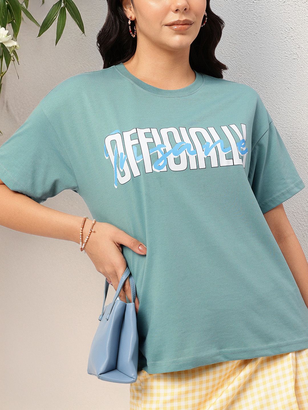 DressBerry Loose & Lively Drop-Shoulder Typo Printed Tee