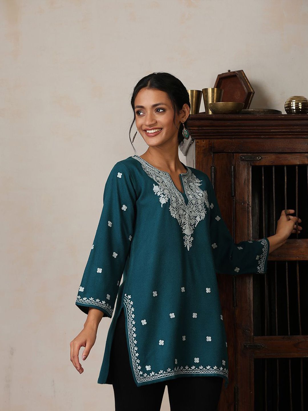House of Chikankari Women Teal Woollen Aari Embroidered Kurti