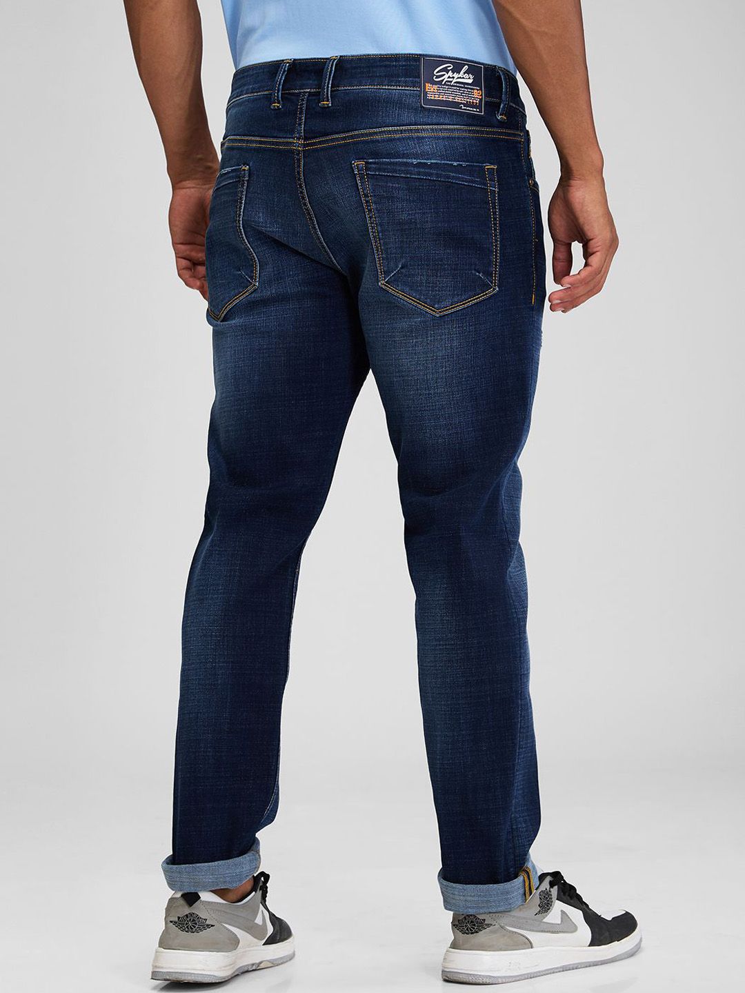 SPYKAR Men Skinny Fit Low-Rise Mildly Distressed Light Fade Stretchable Jeans