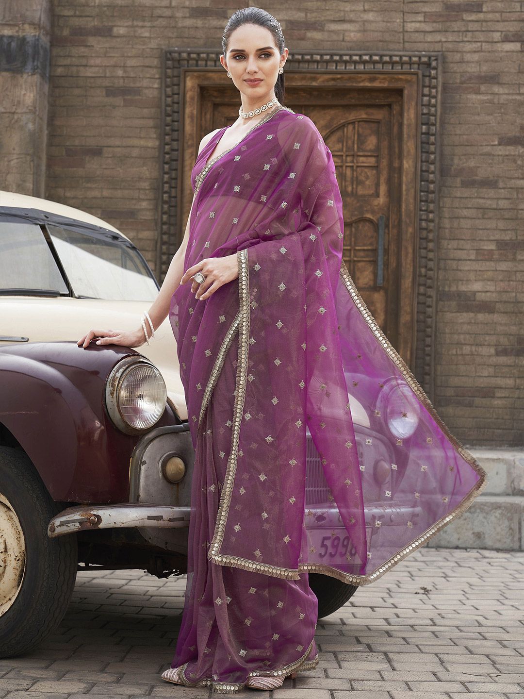 Tikhi Imli Ethnic Motifs Sequinned Net Saree