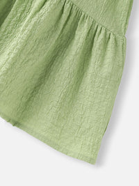 Nauti Nati Girls Green Cotton Crepe Dress with Floral Brooch