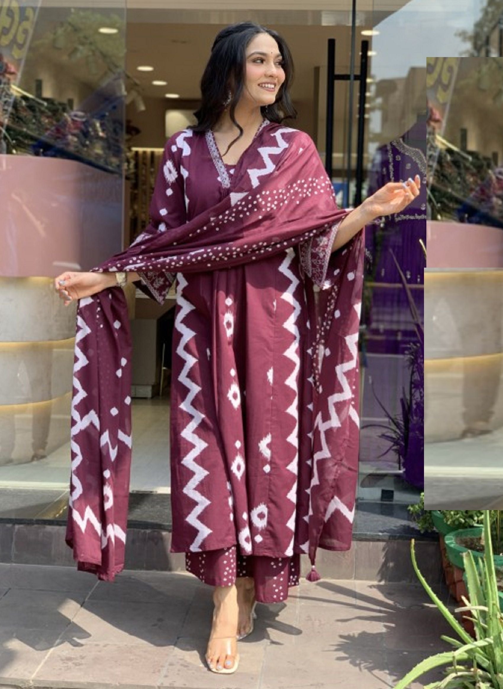 KALINI Geometric Printed Notch Neck Pleated A-Line Kurta With Trouser And Dupatta