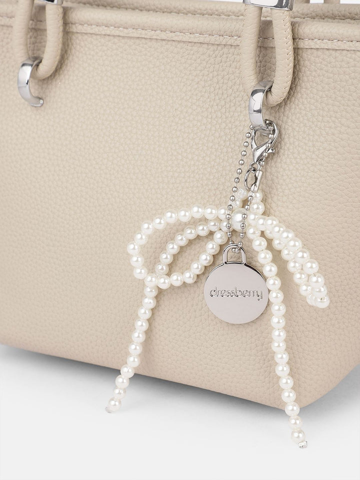 DressBerry Textured Structured Handheld Bag With Embellished