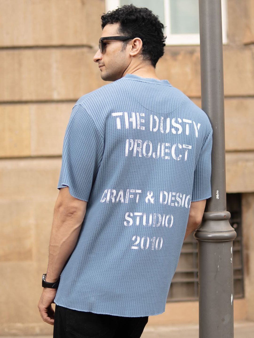 Powerlook SS25 Oversized Typography Printed Structure Knit Henley Neck T-Shirt